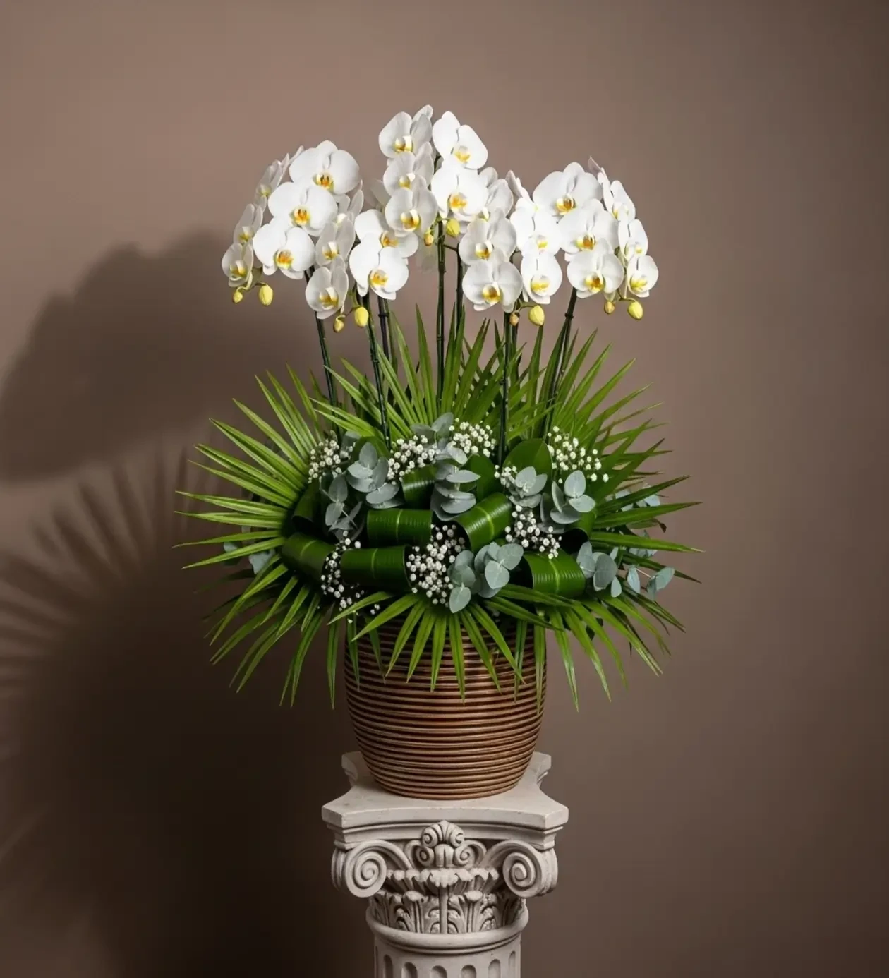 Eternal Elegance: 5-Stem White Orchid & Tropical Leaf Arrangement